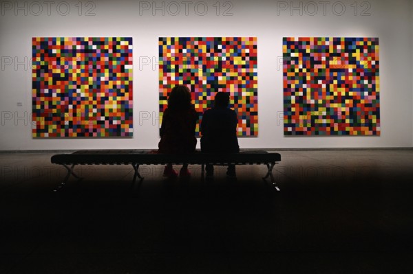 Museum visitors in front of the work 4900 Farben by Gerhard Richter, Neue Nationalgalerie Berlin,