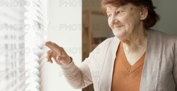 Close up woman looking out window