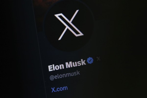 Symbolic image social media, close-up of a dark screen with X logo in Elon Musk's account on the