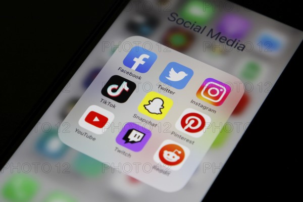 Social media icon, detailed view of a smartphone with social media apps, Facebook, Twitter,