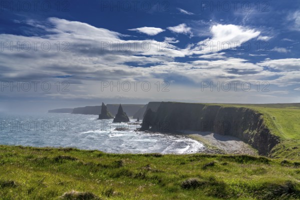 A view of the Duncansby Sea Stacks and wild and rugged coastline of Caithness in the Scottish