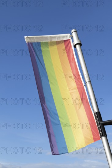 Symbolic image, homosexuality, tolerance, CSD, Pride Week, rainbow flag against blue sky, Germany,
