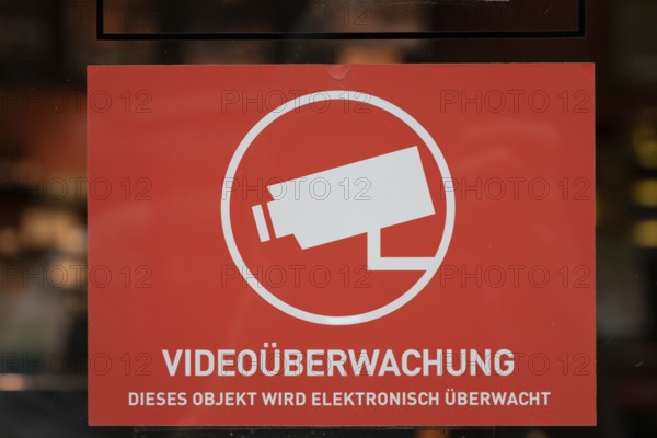 Symbolic image, close-up, sign indicating video surveillance to protect against theft in retail,