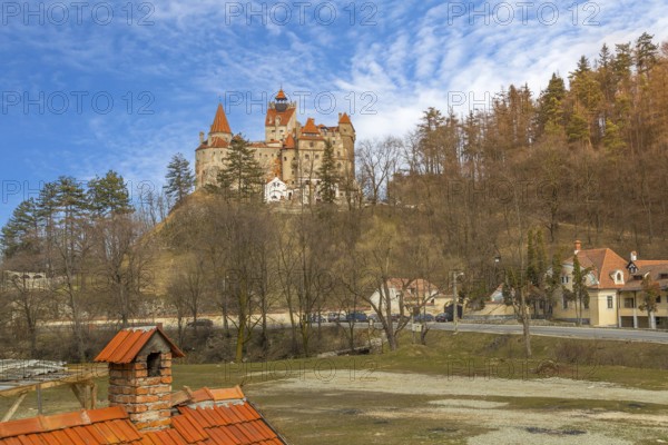 Beautiful panoramic view of Dracula Bran medieval castle and blue cloudy sky, Transylvania,
