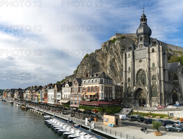 Belgium - 11 August 2019: horizontal view of the Meuse River and the historic old riverside town of