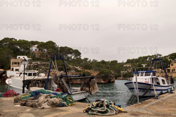 Fishing boats and fishing nets in the harbour of Cala Figuera near Santanyí, Majorca, Balearic