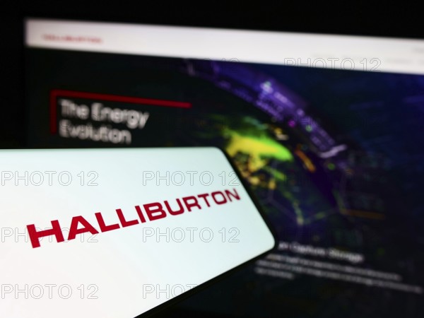 Stuttgart, Germany, 10-26-2022: Cellphone with logo of American fracking company Halliburton on