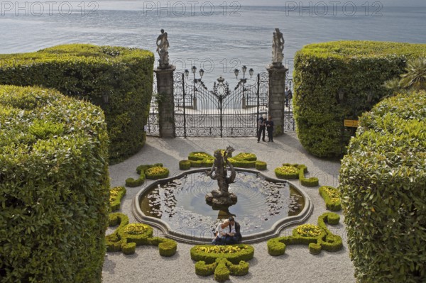 Fountain, botanical garden, Villa Carlotta, view of Lake Como, Tremezzo, Como Province, Lombardy,