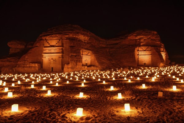 Illuminated Nabataean tombs at night, Hegra or Mada'in Salih, AlUla region, Medina province, Saudi