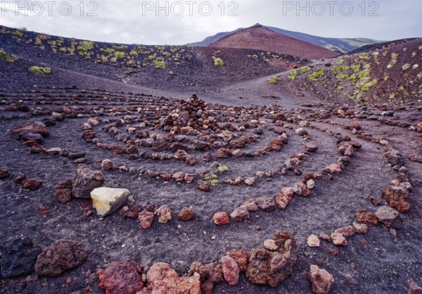 Stones laid in a circle in the crater landscape around the Crateri Silvestri in the Etna National