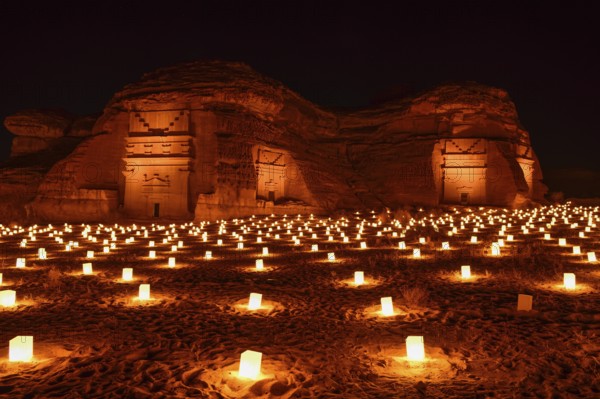 Illuminated Nabataean tombs at night, Hegra or Mada'in Salih, AlUla region, Medina province, Saudi