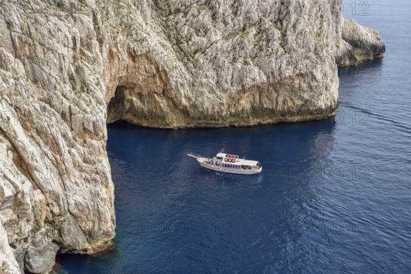 Tourboat at Neptune Grotto, Grotta di Nettuno, Parco Naturale Regionale di Porto Conto, near