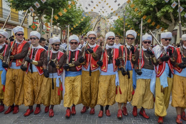 Group in traditional clothing, Moors and Christians Parade, Moros y Cristianos, Jijona or Xixona,