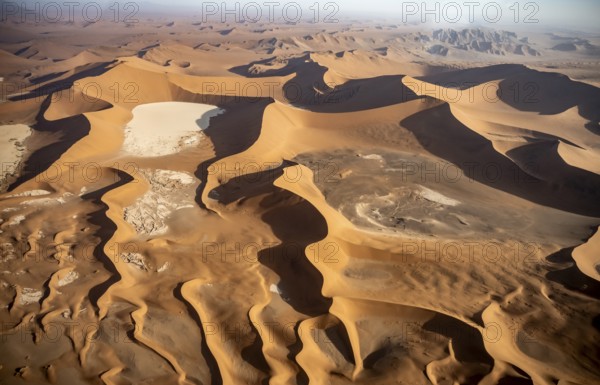 Aerial view, red sand dunes of Sossusvlei, Deadvlei salt pan and Daddy Dune from above, Namib