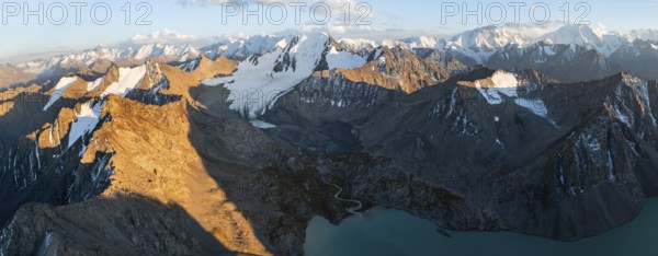 Evening mood, mountain panorama, aerial view, 4000 metre peak with glacier, mountain pass and