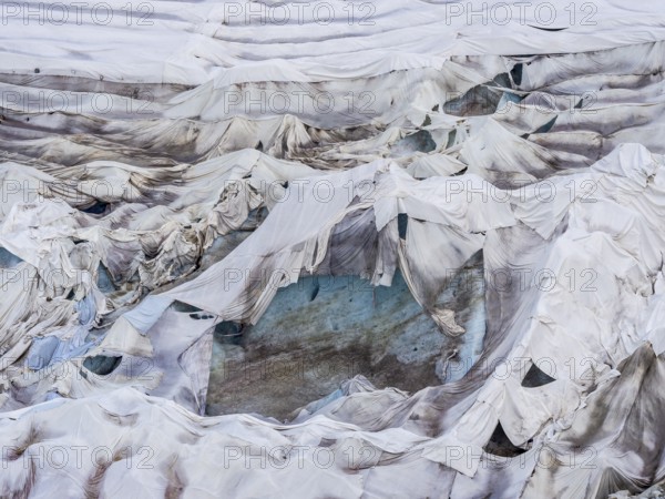 Rhone glacier covered with sheets to protect the ice from melting above the glacier cave,