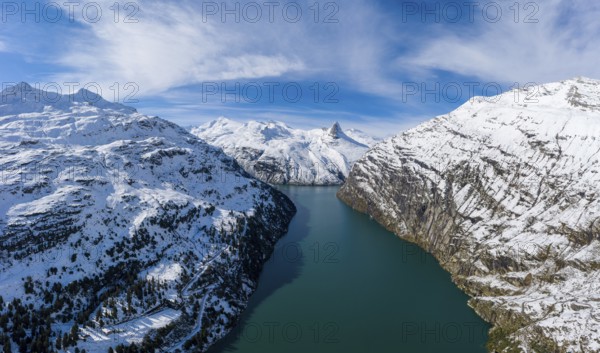 Aerial view over the Zervreila reservoir with the Zervreilahorn in the background, Valsertal,