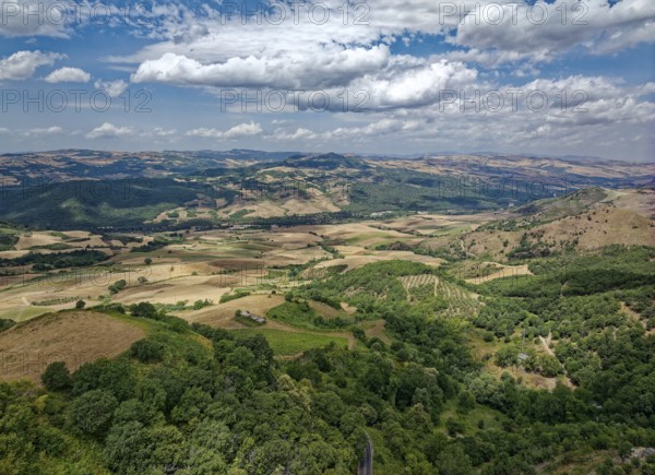 Aerial view of the varied hilly landscape of Basilicata in the north of the Italian province of