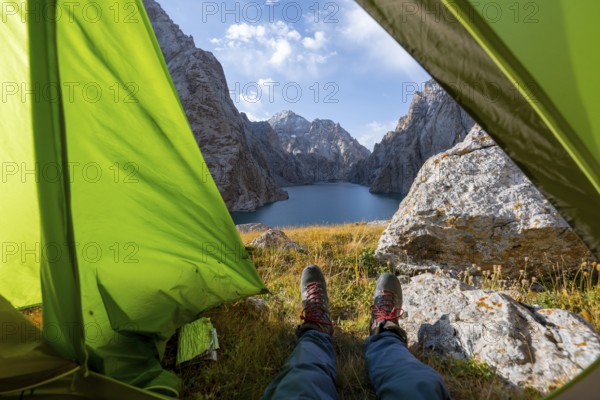 Wild camping, camping in the wilderness with a tent, Kol Suu mountain lake, Sary Beles Mountains,