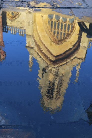 YORK, NORTH YORKSHIRE/UK - FEBRUARY 20 : Reflection of St Helen Stonegate church in a puddle in