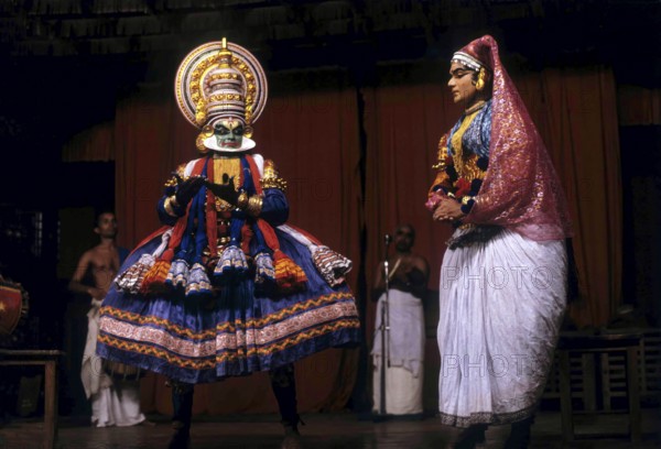 Green and Minukku character in Kathakali at Kerala Kalamandalam, classical dance of Kerala, India,