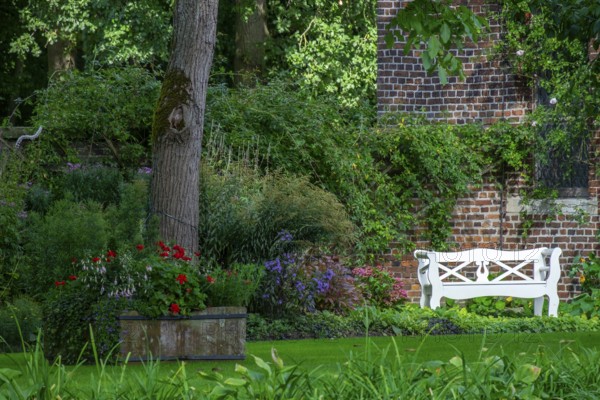 White garden bench, Welbergen, Münsterland, North Rhine-Westphalia, Germany, Europe
