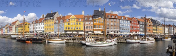 Copenhagen, Denmark, August 21, 2019: Panoramic view of the famous Nyhavn district in the city