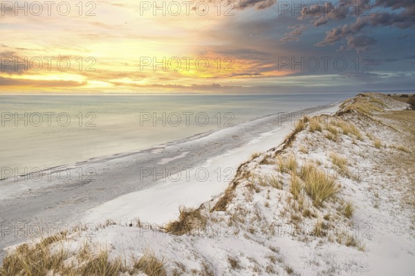 Dramatic sunset at the high dune on the darss. Viewpoint in the national park. Beach, Baltic Sea,