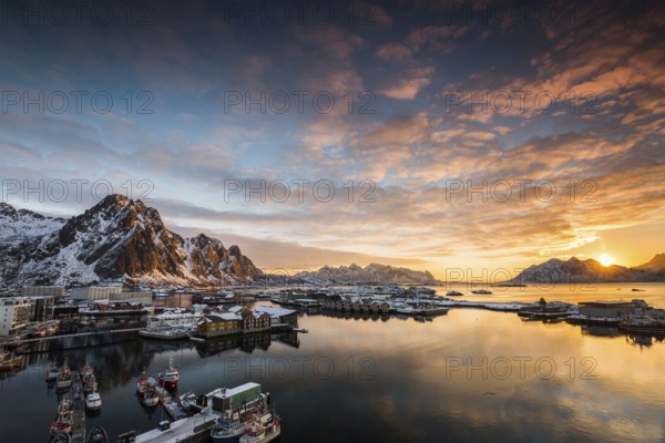View over the port of Svolvaer on the Lofoten islands in colorful early morning sunrise in winter