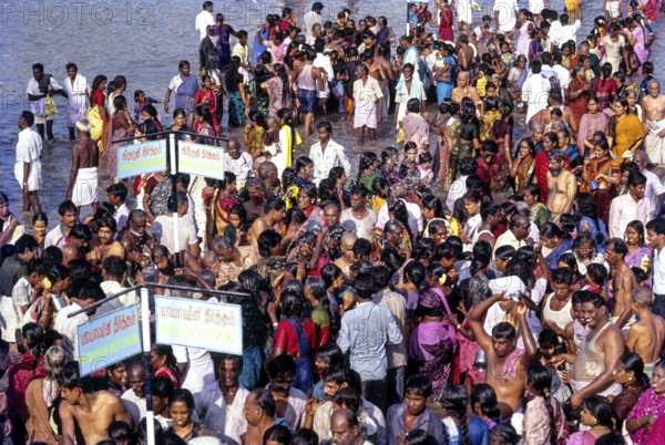 People gathered to take a dip in biodhini and Kruruthi theerthams (sacrad water) during Mahamakham
