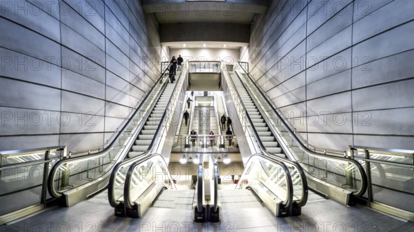 Copenhagen, Denmark, January 20, 2017: People on escalators at Forum metro station, Europe