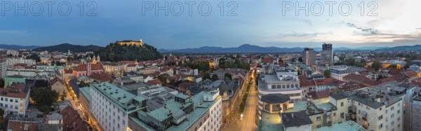 A panorama picture of Ljubljana overlooked by the Ljubljana Castle at sunset
