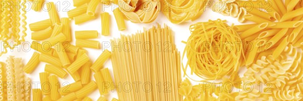 Italian pasta texture panoramic flatlay banner, overhead shot on a white background. Fusilli,