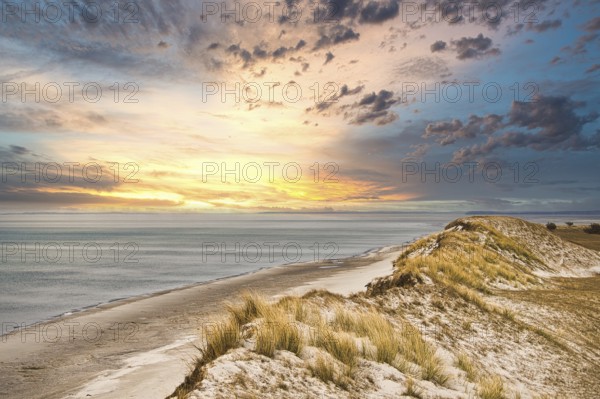 Dramatic sunset at the high dune on the darss. Viewpoint in the national park. Beach, Baltic Sea,