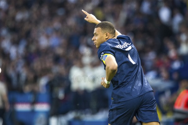 Football match, captain Kylian Mbappe' Paris St Germain has just scored 1-0 for Paris St Germain,