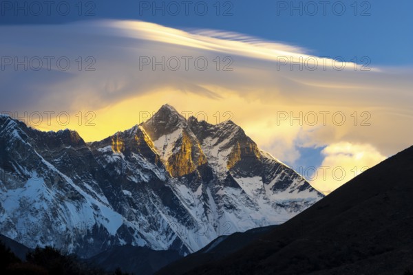 South Face of the eight-thousander Lhotse, with a lenticular cloud above its summits, viewed at