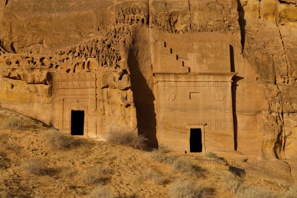 Nabataean tombs at Djabal Al-Ahmar in first daylight, Hegra or Madain Salih, AlUla region, Medina