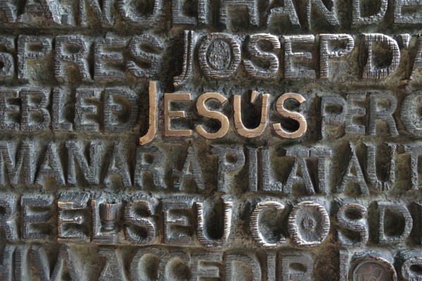 Inscription "Jesus" on the portal of the Passion façade of the Sagrada Familia, Holy Family Church