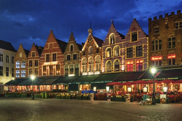 Bruges, Belgium, May 29, 2018: Bruges Grote markt square famous tourist place with many cafe and