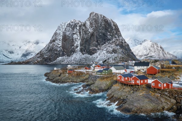 Hamnoy fishing village with red rorbu houses in Norwegian fjord in winter. Lofoten Islands, Norway,