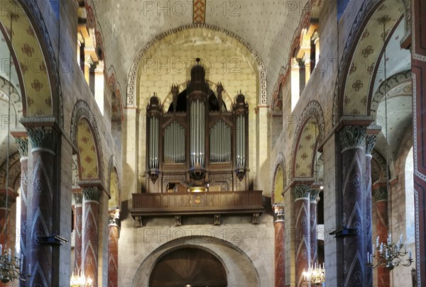 Organ loft of Saint Austremoine church, Issoire. Puy de Dome department. Auvergne-Rhone-Alpes,