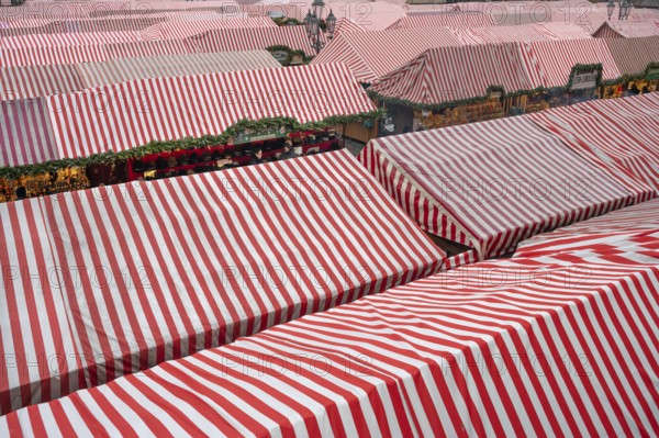 Red and white roofs of the stalls at the Christkindlesmarkt on the main market square, Nuremberg,