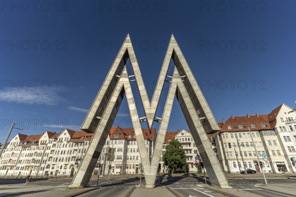 The huge double-M logo of the Leipzig Trade Fair Centre at the East Gate of the Old Leipzig Trade