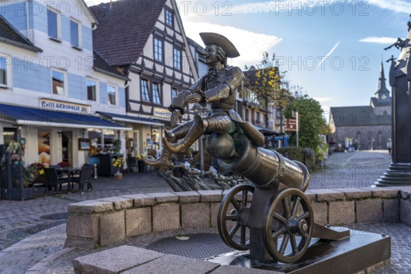 Munchausen figure The ride on the cannonball at the Munchausen fountain in Bodenwerder, Lower