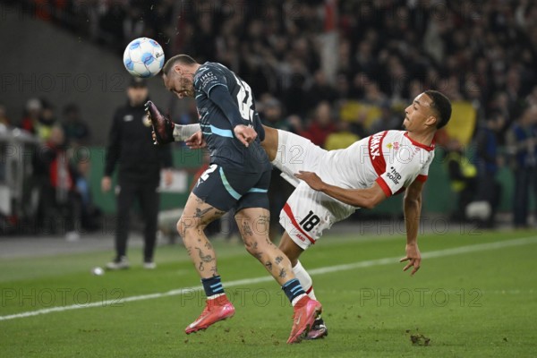 Duel, action Jamie Leweling VfB Stuttgart (18) against David Raum RasenBallsport Leipzig RBL (22)