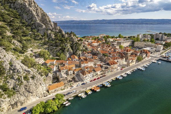 The old town centre of Omis with the ruins of the Mirabella or Peovica fortress seen from above,