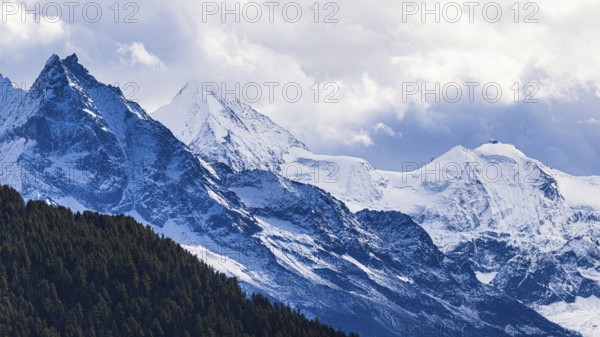 Snow-covered peaks of the mountains Le Besso, and Obergabelhorn, Val d'Anniviers, Valais Alps,
