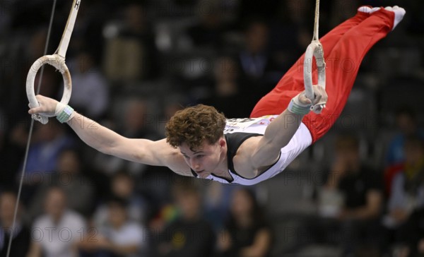 Alexander Kurz GER rings action gymnastics, EnBW DTB-Pokal, Porsche-Arena, Stuttgart,