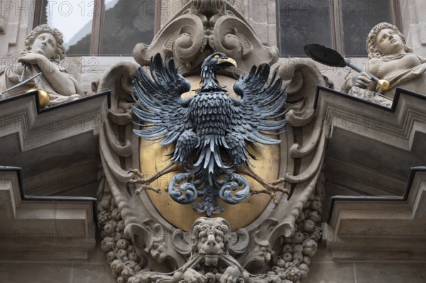 Sculptural imperial eagle above an entrance portal of the Old Town Hall, built in 1616, Nuremberg,