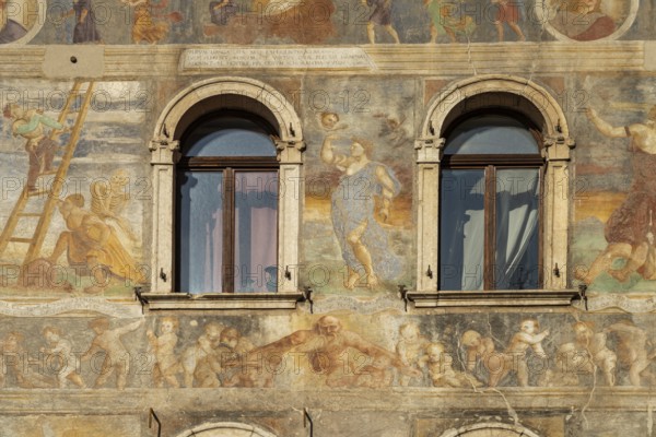 The painted façade of the Case Cazuffi Rella houses on Piazza del Duomo in Trento, Trentino, Italy,